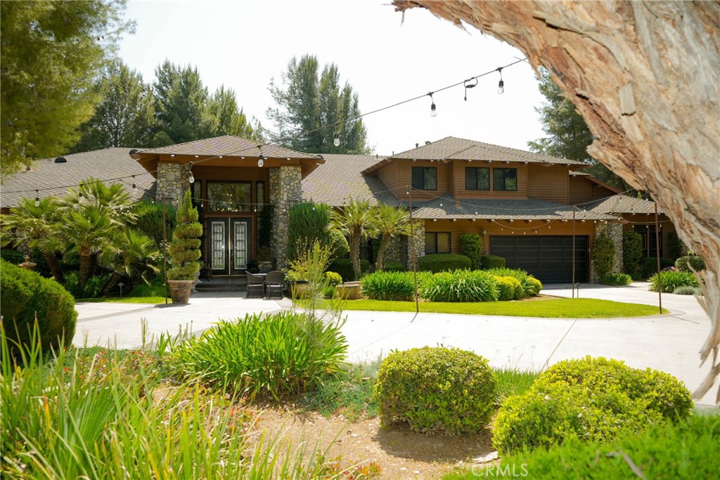 Welcome to Hawk Ranch – a truly exceptional 40-acre ranch estate and turnkey event venue located on Murrieta’s prestigious westside. Zoned Rural Residential (RR) with a fully approved Minor Conditional Use Permit (MCUP) for weddings and events, this rare property blends luxury living, thriving agri-tourism businesses, and substantial income opportunities. Just minutes from I-15, I-215, and the renowned Temecula Valley Wine Country, Hawk Ranch offers privacy, scale, and accessibility in one of Southern California’s most sought-after rural communities.
The estate features five separate residences totaling approximately 13,500 square feet. At the heart of the property is a ±7,300 SF custom main residence designed in a lodge style with impressive natural wood interior finishes, vaulted ceilings, and a beautifully landscaped yard and pool ideal for entertaining. Four additional homes—ranging from 950 to 2,500 SF—are ideal for guest housing, potential short-term vacation rentals or B&B operations.
A ±2,300 SF banquet/gallery hall anchors the wedding and events business, complemented by beautifully landscaped ceremony lawns, tree-lined reception areas, bride and groom suites, and a tranquil 1/3-acre pond stocked with fish and accented by a central fountain. Business operations include weddings and receptions, private farm animal tours, cattle and farm product sales, a souvenir retail shop, and residential rental income.
Projected net annual income exceeds $450,000, with $200,000 from weddings and events, $150,000 from rentals, and $100,000 from agri-tourism operations. All ranch and farming equipment is included, offering a seamless transition for the next owner-operator.
Originally developed by builder and outdoorsman William Mitchell as a private retreat, the property was granted a CUP in 2014 and has since been thoughtfully expanded by the current owners to support a wide range of uses and revenue streams. Additional features include a 5-car garage, 60-foot-deep RV garage, two operational water wells, multiple septic systems, and a 5/8-mile horse racing track.
One of only four permitted wedding venues in Murrieta, Hawk Ranch presents an unparalleled opportunity for investors, retreat operators, hospitality entrepreneurs, or multi-generational buyers seeking a lifestyle asset with income, history, and growth potential.
Shown by appointment only. Do not disturb active business operations.