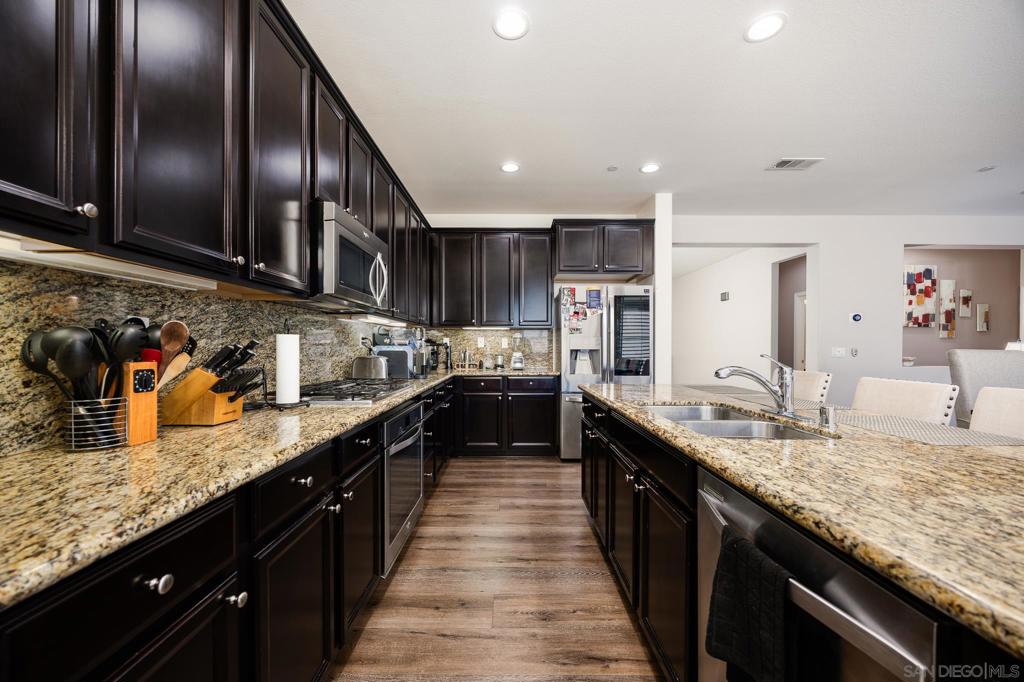 Welcome to 34897 Ryanside Ct! This beautifully maintained 4-bedroom, 3 bath home offers 2,789 square feet of open living on a 10,018 sq ft lot. Enjoy a bright, flowing layout with a modern kitchen, cozy fireplace, bonus office/guest room and a luxurious primary suite with jetted tub plus walk in closet. 3 car garage and low $34/mo HOA this home blends comfort, style, and convenience. Picture yourself driving up to your new home-