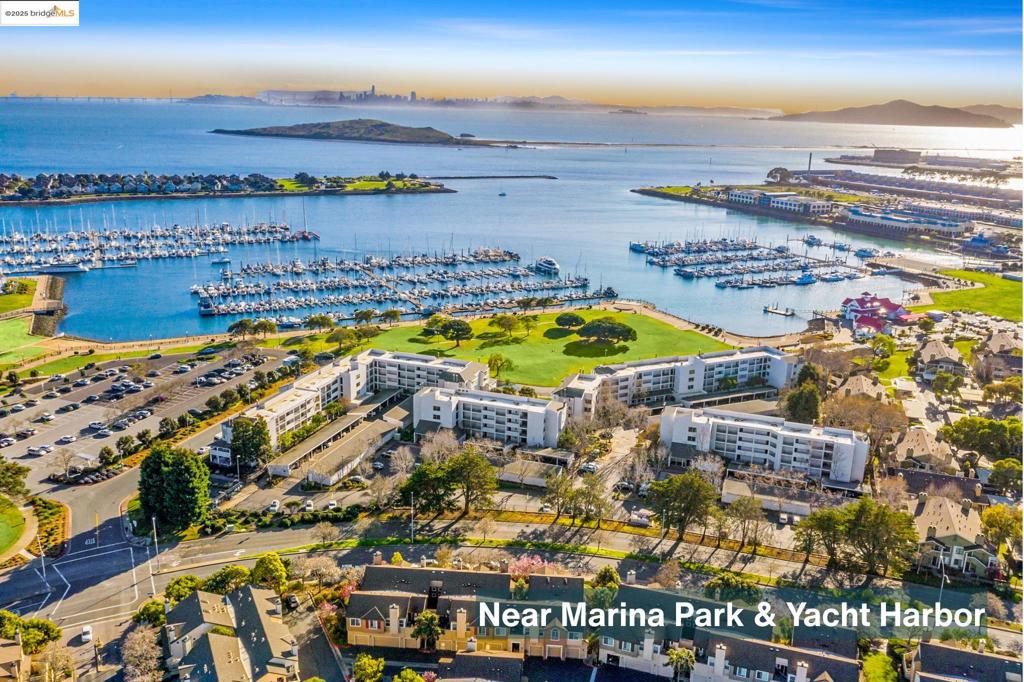 Rare Marina Bay townhouse-style condo that lives like a single-family home! Soaring vaulted ceilings, abundant natural light, and a cozy fireplace welcome you inside. The open floor plan includes a modern kitchen with stainless steel appliances, gas range, tile counters, and sleek fixtures, A full bedroom and bath on the main level make hosting guests, working from home, or multi-generational living effortless. Unlike most condos, this home features an expansive private yard—perfect for entertaining, gardening, play, or simply relaxing in your own retreat. Upstairs, enjoy two en-suite bedrooms, including a spacious primary retreat with vaulted ceilings, walk-in closet, and double vanity. To all the “no garage is a deal-breaker” buyers—this one delivers! Comes with a one-car garage plus an assigned parking space for your car, bikes, toys…or even your “organized” junk. HOA amenities include gated entry, pool, hot tub, guest parking, and lush landscaping. Just blocks from Marina Park and Marina Bay Yacht Harbor, with access to the Bay Trail, waterfront views, and a lively Farmers Market. Ideal for commuters with easy access to Hwy 580/80, BART, and the Richmond–San Francisco Ferry. This home doesn’t just offer a place to live—it offers a true California lifestyle.