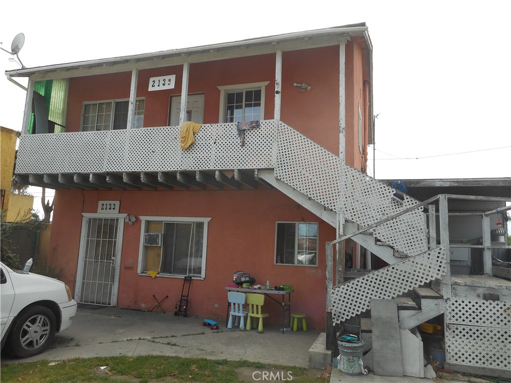 Duplex in West Long Beach. Property in need of updating and deferred maintenance. Great property to rehab and flip or to hold in the portfolio as a long-term investment with substantial growth and upside potential. The upstairs unit features 1 bedroom and 1 bathroom. Downstairs there is a 1 bedroom 1 bath unit with 2 bonus rooms and a garage with alley access. The property is positioned at the rear of the lot, leaving ample space in the front to add Accessory Dwelling Units (ADUs). Although the assessor records show property is a total of 936 sqft, the property seems much larger. Property is sold in its present AS IS condition, Sellers will not do any repairs whatsoever. Please do not disturb the occupants.