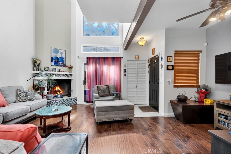 Welcome to this beautifully updated Tarzana townhouse, where soaring cathedral ceilings and a cozy fireplace create an inviting open-concept living space. Recently remodeled, the home features laminate flooring throughout, double-pane soundproof windows, and a modern kitchen with stainless steel appliances, quartz countertops, a mosaic glass backsplash, under-cabinet lighting, and custom ceiling fixtures. A spacious dining room, conveniently located just off the kitchen, provides an ideal space for easy entertaining. Upstairs, you’ll find two en-suite bedrooms and a laundry area with a high-efficiency front-load washer and dryer. Additionally, highlights include ample storage, central air and heat, a charming patio for indoor-outdoor living, and secure Butterfly MX smart intercom access. Side-by-side garage parking and guest spaces are included in the gated garage, and the prime location—nestled between Encino and Woodland Hills—places you across the street from Starbucks and a park, minutes from Ventura Blvd’s shops and dining, and close to the Westfield Topanga Mall and new Rams Village. Don’t miss this opportunity to call it home—schedule your private showing today!