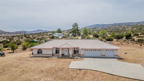 Photo of 8767 Silver Rock RD, Pinon Hills, CA 92372 (MLS # HD26179446)