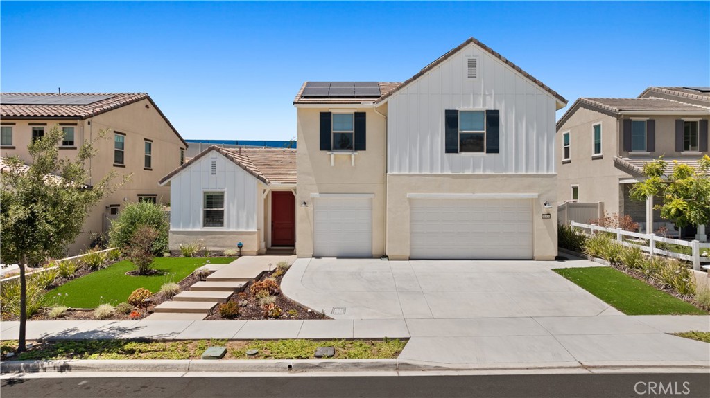 Modern 2020-built 4BR/2.5BA home in the highly sought-after SL Rey community of Bonsall. Located on a quiet street near top-rated schools and the future Bonsall Community Park, this spacious home offers both comfort and convenience. Light-filled open floor plan with tall ceilings, luxury hard flooring on the main level, and plantation shutterst. The spacious kitchen features quartz countertops, premium stainless appliances, and a large island, opening to the family room and oversized sliding doors leading to a large private backyard - perfect layout for a potential swimming pool and entertainment bar build out, with a block privacy wall.
The first-floor primary suite offers comfort and convenience. A lower-level office can be easily converted into a 5th bedroom. Upstairs includes secondary bedrooms and a second laundry area (additional laundry in garage). Energy-efficient upgrades include fully paid solar, dual-zone A/C and heat, whole-house fans, tankless water heater, and a newer security system. Plenty of space to live, work, and entertain in one of North County’s most peaceful settings.