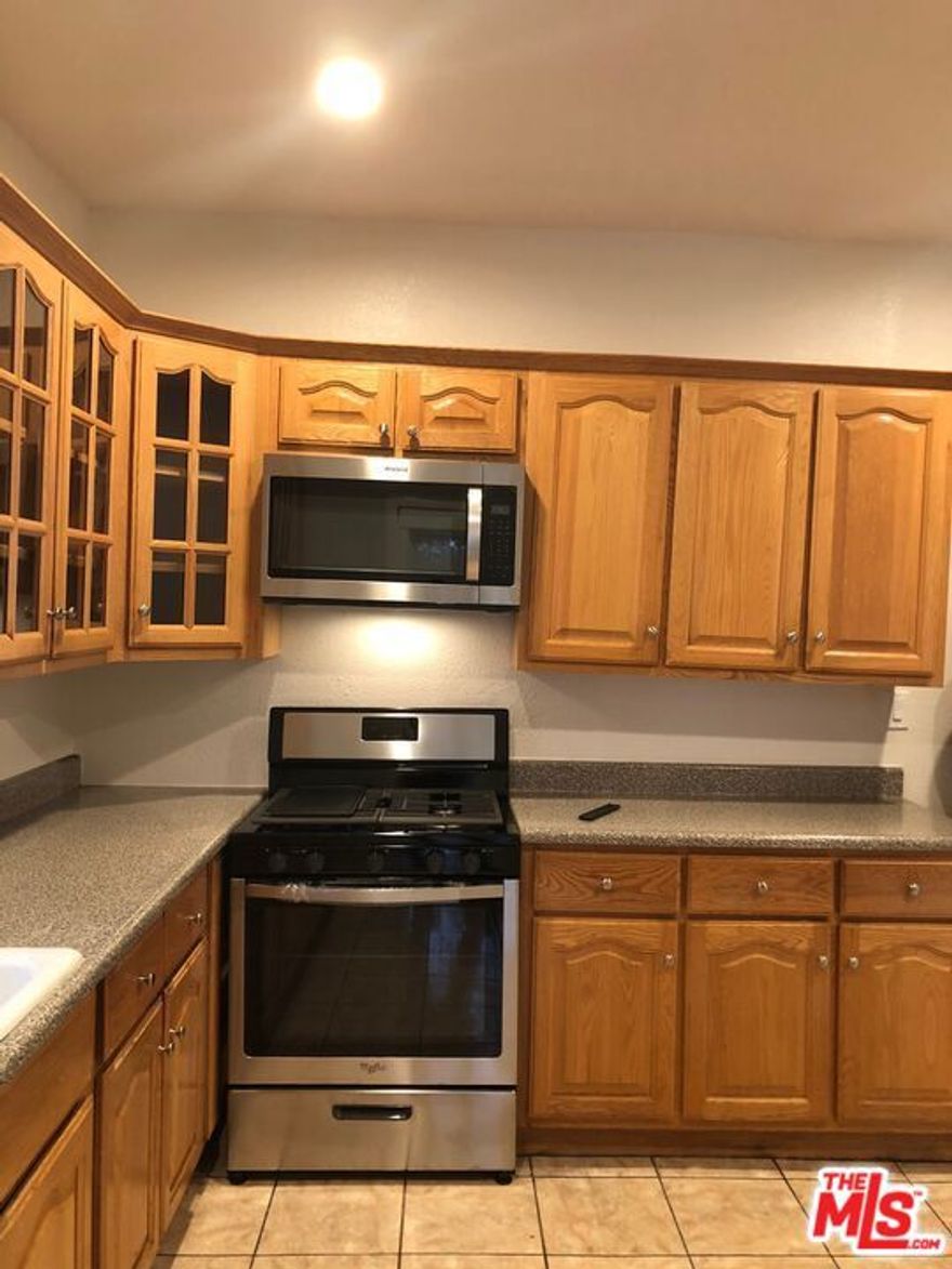 Seize this exceptional income property investment opportunity near USC and Exposition Park, ideally located west of the 110 Freeway and just a short walk from the iconic Coliseum and BMO Stadium. This beautifully updated duplex offers two well-maintained, detached buildings, providing both privacy and versatility. The larger unit features 3 bedrooms and 2 bathrooms, while the smaller unit includes 2 bedrooms and 2 bathrooms, each with the convenience of in-unit washer and dryer.Modern comforts are assured with central air conditioning and heating, ensuring year-round tenant satisfaction. The property is meticulously maintained by the current owner and will be delivered with reliable tenants in place, offering immediate rental income. This is a prime investment for those seeking a stable, income-generating asset in a vibrant and highly sought-after area.