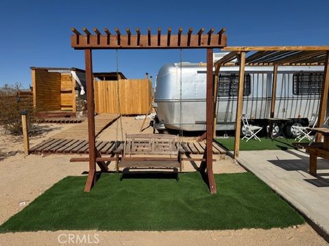 Photo of 68175 Pole Line, 29 Palms, CA 92277 (MLS # OC25263986)