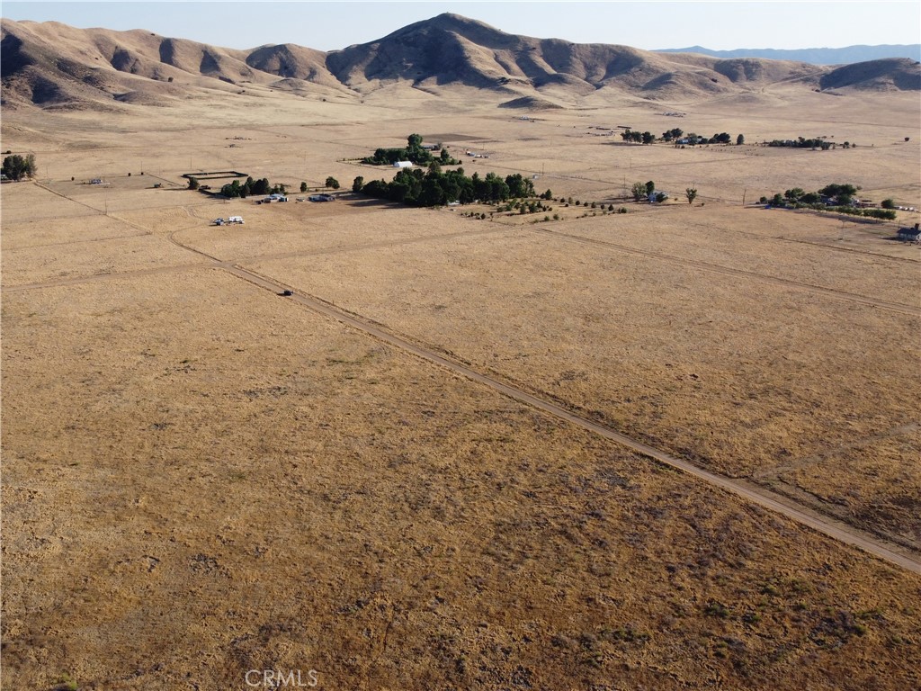 Escape to the serene beauty of California Valley with this incredible 2.5-acre parcel of land, ideally located on the west side of the Valley, where the water quality is better. Nestled among rolling hills and open skies, this property offers endless opportunities for those seeking tranquility, adventure, or investment potential. Imagine building your dream off-grid retreat, cultivating a sustainable homestead, or simply holding onto this land as a smart investment in a growing area. You’ll be just a short drive from the Carrizo Plain National Monument and a little over an hour from the stunning beaches of the Central Coast. Enjoy access to vibrant wildflower blooms, scenic hiking trails, and abundant wildlife. With its flat terrain and sweeping mountain views, this land is a blank canvas for your vision—whether you’re dreaming of a weekend getaway or planning a long-term project, this is your chance to own a piece of California’s natural charm. COORDINATES: 35.288237, -119.973753