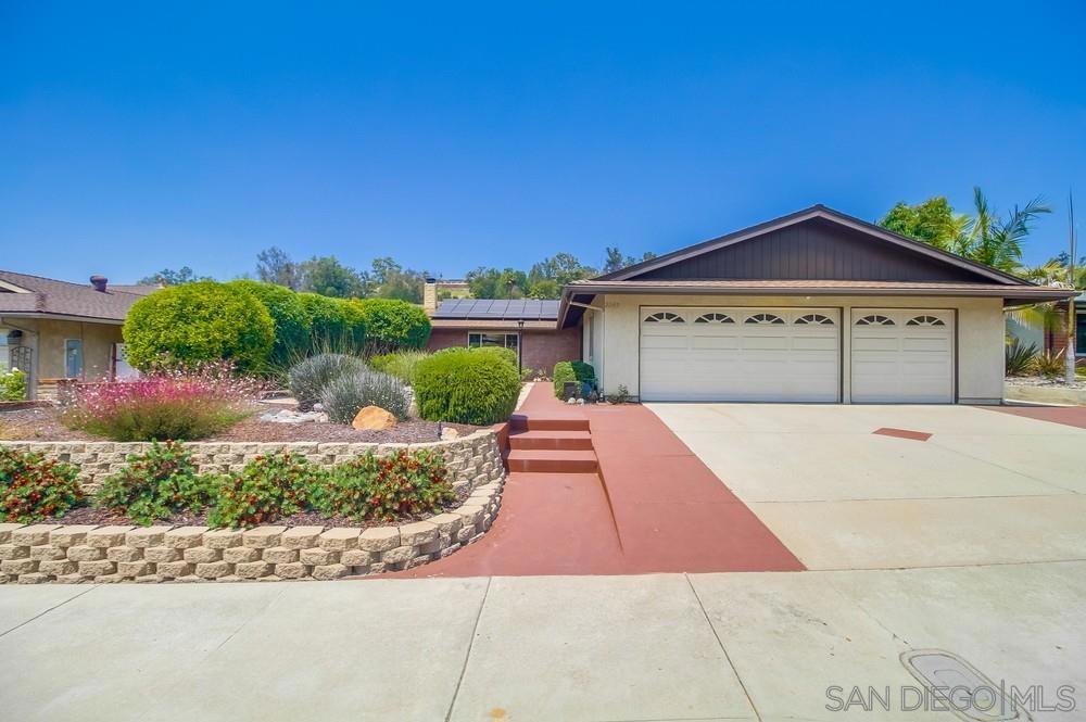 It's not just a home-it's the Fletcher Hills Highlands lifestyle at its finest! Rarely available, highly sought-after, 1 story home on one of the finest streets in Fletcher Hills! Beautiful flowering lush landscape greets you! Open the gorgeous wood front doors to formal entry and fall in love with the abundance of natural light throughout! To your left, the spacious living room with oversized front window allowing for more fabulous light and cozy fireplace for cooler evenings! Living room flows into the dining room-ideal for family gatherings! Stunning updated kitchen with quartz counters, gas stove, handsome wood cabinetry, small prep counter, skylight, and breakfast bar seating! Gourmet kitchen opens to extra large family room with slider to backyard! Primary suite with en-suite luxury bath! Nicely sized additional bedrooms-one makes an a perfect office too! Extremely private and quiet backyard with covered patio! Ample space for BBQ's, kid play, and pets! Don't miss the Meyer Lemon, Black Jack Fig, Golden Delicious Apple, and Navel Orange trees! Owned Solar! Brand new carpet! Breathtaking engineered wood floors, 3 car garage+! Development offers miles of open space trails for walking, biking, and enjoyment of nature. Make this YOUR home before someone else does! Welcome Home!