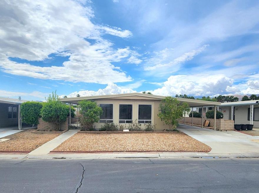This property has a unique 2 bed/2 bath cozy open floor plan with a step-up dining area. The interior of the home has been recently painted and the main bath has been updated. The two spacious bedrooms and den area have brand new carpet and are located at the back of the home for privacy.  New blinds have also been installed in the living and dining rooms. Bring your imagination and with a little TLC this gem can become the perfect investment opportunity that can be used as a Rental, a Vacation Getaway, or a Permanent residence. Located between the Recreation Center and the Clubhouse, you can enjoy all the amenities the community offers.  The home is still on tags for possible Tax Savings Opportunity, Palm Desert Greens Country Club is one of the friendliest and most popular active 55+ communities in the valley and offers a quality of life that is second to none! You OWN the LAND and the low $400 monthly HOA fee includes 24/7 Guard Gated Security, Cable TV, Internet, Trash Service, FREE GOLF and so much more! Truly one of the best buys in the valley!