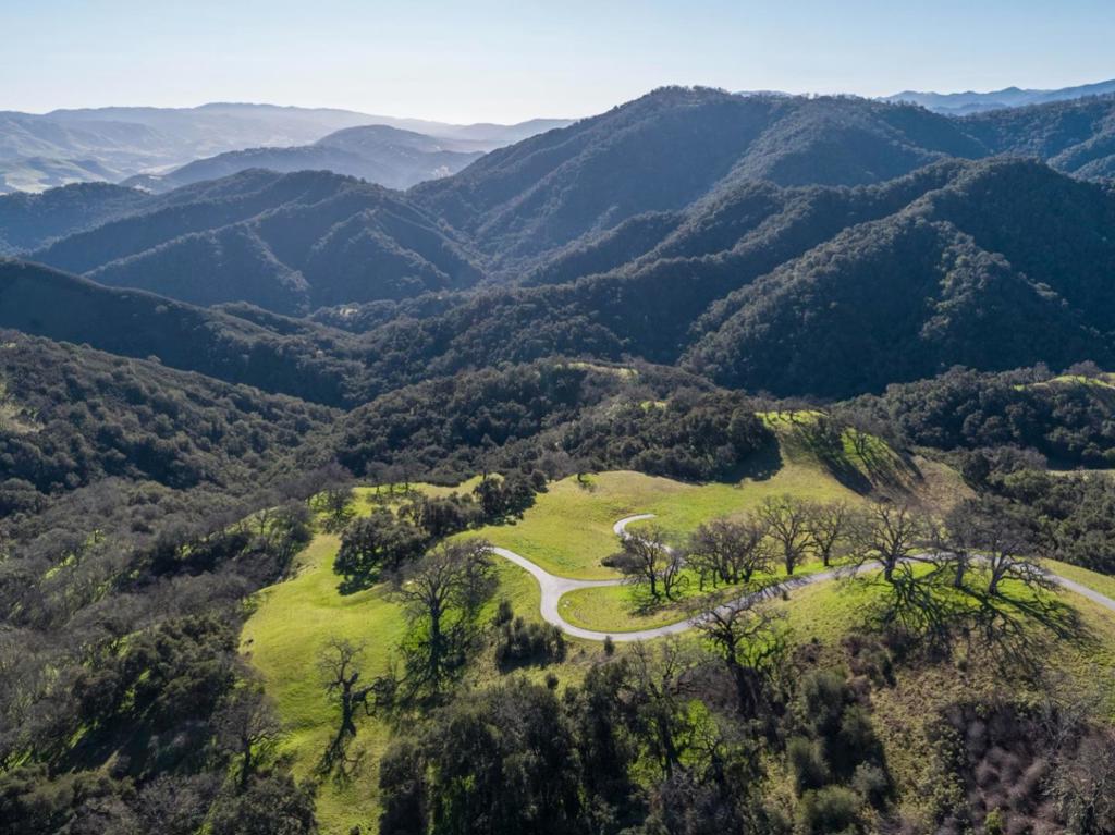 Discover the ultimate haven for your future home atop Black Mountain Trail within the prestigious Santa Lucia Preserve. This expansive 44.87-acre estate offers a unique opportunity for the discerning buyer to curate their lifestyle and architect the ideal residence on the substantial 3.32-acre building envelope. in addition to a one-plus story main home, enjoy the rare opportunity to incorporate full-time equestrian use, permitted on this homesite, along with the allowance for a guest house and caretaker's residence, Revel in breathtaking, multi-layered views stretching east and south, and enjoy the tranquility of end-of-road privacy, all while being just a short drive to the exclusive Preserve Ranch & Golf Club amenities. Dont miss your chance to own a piece of this exclusive community.