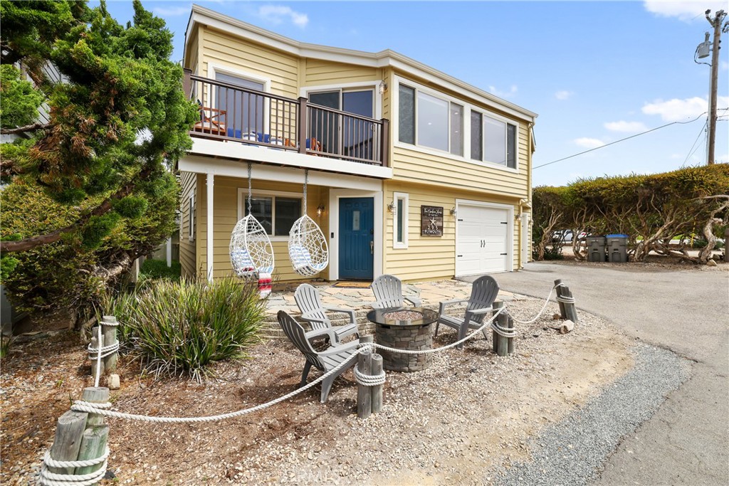 Located in one of Cambria’s most sought-after coastal neighborhoods, this luxuriously updated home is just blocks from beach access, Shamel Park, and the breathtaking trails of Fiscalini Ranch. Also within walking distance are the iconic shores of Moonstone Beach and Cambria’s public pool. Just steps from the ocean bluffs, you can begin each morning with coffee on a park bench as the waves crash below.
Bright, clean, and filled with natural light, the home blends modern comfort with timeless coastal charm. The classic white kitchen features elegant countertops, bar seating, and ample storage. A spacious dining area is surrounded by tall windows, while the living room showcases exposed wood beams and a cozy fireplace. Step out onto the balcony to enjoy partial ocean views and cool sea breezes.
Upstairs, the open layout offers glimpses of the Pacific, where whales may spout in the distance and stars fill the sky at night. The primary suite is a calming retreat with a spa-inspired en suite featuring a soaking tub and separate shower. Downstairs, you’ll find two additional bedrooms, a full bath, and a convenient laundry area.
Set on a wide, paved street—rare for Cambria—with flat parking, two attached single-car garages, and additional parking, the home sits in a quiet, established neighborhood with large lots and beautiful homes.
A hard-to-find vacation rental license adds even more appeal, offering flexible use as a full-time residence, weekend getaway, or income-producing property in one of the Central Coast’s most charming towns.
Schedule your private showing today!