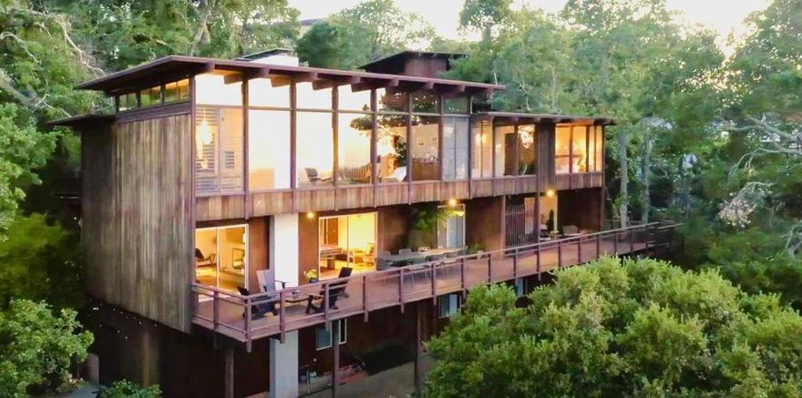 Mid-Century Modern enthusiasts will delight in this one of a kind architectural gem. Designed by architect Alan Blair, this home boasts three levels of blissful views reaching from San Francisco to Santa Clara. A host's dream! Tucked away from the flats, this stunning retreat is quiet and private. The home boasts three large decks, a hot tub, two gas fireplaces, an expansive remodeled lower level and two Tesla chargers in the garage, five bedrooms and three and a half bathrooms, an office upstairs and two living areas. The dining room contains Herman Miller light fixtures and high ceilings meet walls of expansive glass to thrill and entertain guests. Come claim this magical home that some have said has the best views in the Silicon Valley and experience all that this great community of Ladera offers.