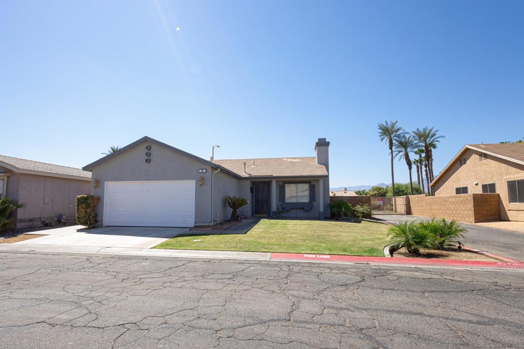 Charming 2-bedroom, 2-bathroom home located in the desirable community of Sunny Side Estates in Indio. This centrally located residence offers an inviting open-concept layout, perfect for both relaxing and entertaining. The home features a spacious fully enclosed yard with a covered patio, ideal for outdoor dining or enjoying the desert evenings. Nestled in a small, welcoming community, this property combines comfort, convenience, and privacy--making it a wonderful place to call home.