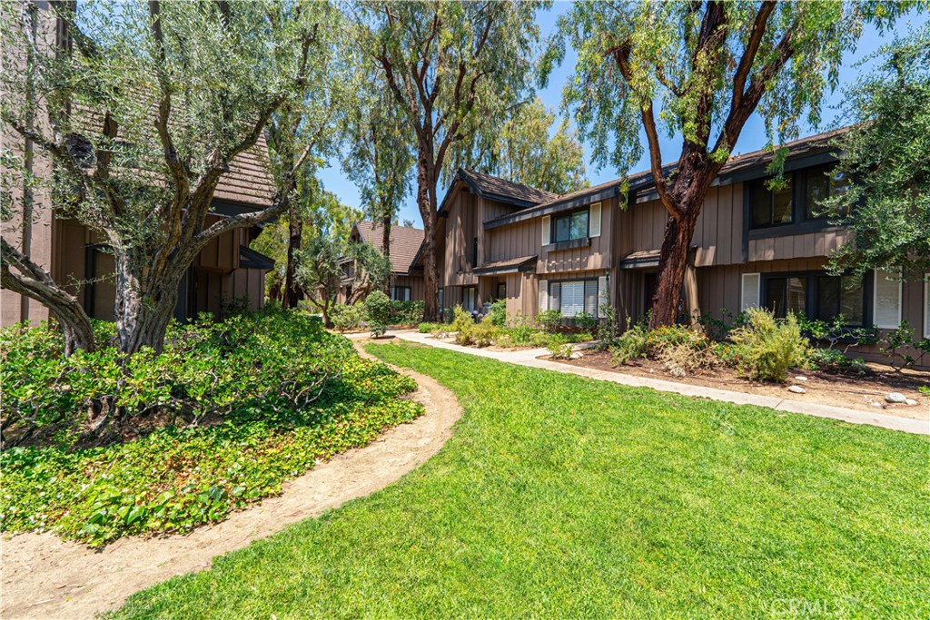 Offered for the first time in decades, this spacious 3-bed, 2.5-bath townhome is nestled in the well-maintained Northridge Gardens community, just minutes from CSUN and Northridge Fashion Center.
Step inside to nearly 1,600 square feet of functional living space with a modern open-concept layout. The updated kitchen features bold navy cabinetry, sleek stone counters, stainless steel appliances, and a large island perfect for entertaining. Adjacent to the kitchen, the open dining and living area flows seamlessly to a private patio—ideal for grilling, gardening, or soaking up the California sun under the pergola.
Upstairs, you'll find generously sized bedrooms, including a spacious primary suite with an ensuite bath and plenty of closet space. Additional highlights include in-unit laundry, central A/C, a HALO whole-house water conditioning system, and direct access to a detached two-car garage with ample storage and even a 220V outlet—great for workshop use or future EV charging.
Enjoy lush greenbelt views from your front door and take advantage of the community’s well-kept amenities: pool, tennis courts, and tree-lined walking paths.
Conveniently located with easy access to 118, 405 and 101 freeways, schools, and shopping, this home blends privacy, comfort, and convenience in a hard-to-beat location.