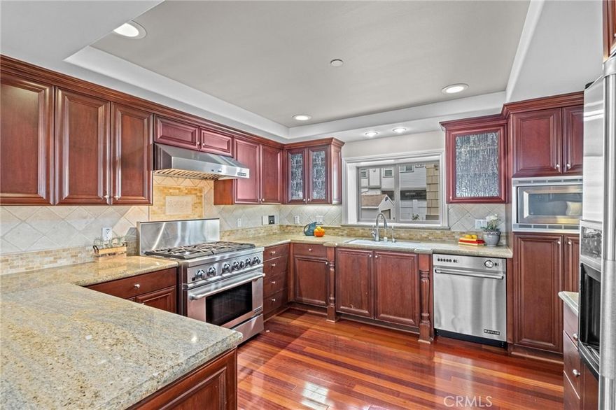 This Stunning Ocean View Custom Townhome is one of the lowest price per sq ft in South Redondo!! This spacious, elegant 4-bedroom, (2 on a lot) is a few blocks to Hermosa and Redondo beaches and close to award-winning schools.

Enter through grand wrought-iron doors to wood floors and a sweeping staircase. The lower level features a private bedroom with en suite bath, walk-in closet, and direct garage access.

Up the stairs you'll find the primary suite which boasts a fireplace, oversized walk-in closet, and spa-like bath. Two additional bedrooms share a Jack & Jill bath, each with walk-in closets.

The top main living level showcases soaring ceilings, a light-filled living room with fireplace, built-in cabinet, double pane windows, a deck, large formal dining, and a gourmet kitchen with stainless steel appliances. On this level: there's also a guest bath, a separate laundry room and access to the roof top deck where you'll enjoy sweeping ocean views and sunsets! Close to top restaurants, shopping, biking and water activities. 

Anita becomes 190th to the North and Herondo to the West. Nearby Plant is inactive, No HOA fee. Both decks were recently re-done, new articfial grass in front yard and a new fridge and microwave.