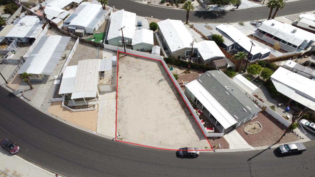 Do not miss the opportunity to own this lot in Tri-Palm Estates 55+ community where you own the land with low HOA fee of $216 monthly. Located under Riverside County jurisdiction, you'll be surprised how easy it is the process to install a Mobile Home. As a resident of Tri-Palms Estates you'll also enjoy the perk of FREE GOLFING. This property is in a prime location, with easy access to the I-10 freeway and nearby restaurants and stores like Walmart, Home Depot, Costco, and Sam's Club. Plus, you can reach anywhere in the Coachella Valley in less than 20 minutes. And there's more good news - this home is in the IID territory, which means lower electric bills. As a Tri-Palm Resident, enjoy full access to fantastic amenities like two outdoor pools and spas, top-notch shuffleboard courts, well-lit tennis courts, and a clubhouse with dining, banquets, and a recreation lounge. Don't wait too long - be sure to make an offer before someone else grabs this wonderful opportunity **Subject to Escrow cancellation****Seller is willing to finance with 50% down**