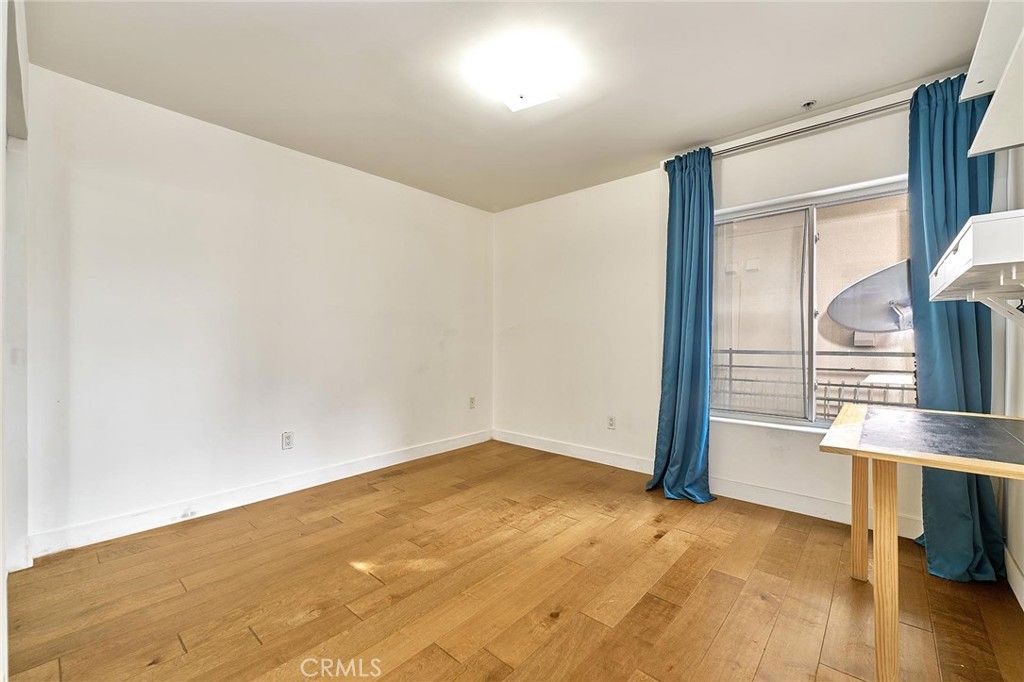 Photo of 1036 S Serrano Ave #105, Los Angeles, CA 90006 (MLS # PW26031160)