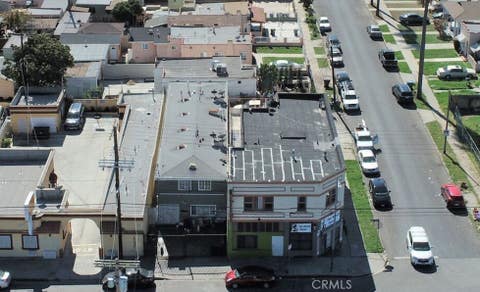 Photo of 2820 W Slauson Avenue, Los Angeles, CA 90043 (MLS # DW26110910)