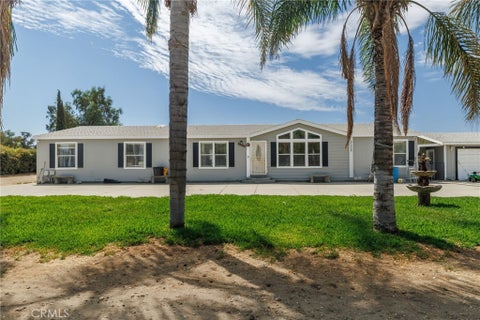 Photo of 31559 Wolfskill AVE, Nuevo, CA 92567 (MLS # SW26190482)