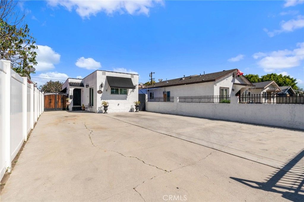 Photo of 119 E 75th St St, Los Angeles, CA 90003 (MLS # DW26051594)