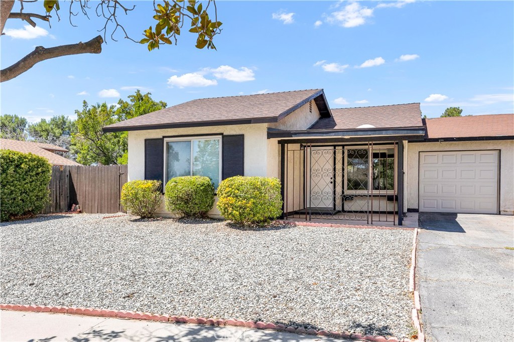 Welcome to 233 Janan Court, a charming single-story home tucked away on a peaceful cul-de-sac in the desirable 55+ community of Peacock Valley. This well-cared-for residence offers 2 bedrooms, 1 bathroom, and an additional den off the kitchen that can easily serve as a hobby room, office, or reading nook—giving you extra flexibility to suit your lifestyle. Inside, you’ll find a bright and inviting floor plan with beautiful wood laminate flooring flowing through most of the home. The kitchen is efficiently designed and includes convenient laundry hookups for added ease. Just beyond the main living area, an enclosed California room expands your living space, providing the perfect spot to enjoy morning coffee, work on crafts, or simply relax while overlooking the backyard. The property sits on a manageable lot with low-maintenance landscaping and also includes an attached garage. Best of all, the Peacock Valley community offers one of the lowest HOA fees around—just $200 per year—making this an affordable and attractive option for active adults. Located close to shopping, dining, and easy freeway access, this home combines comfort, convenience, and value. Don’t miss the chance to make this lovely home your own!