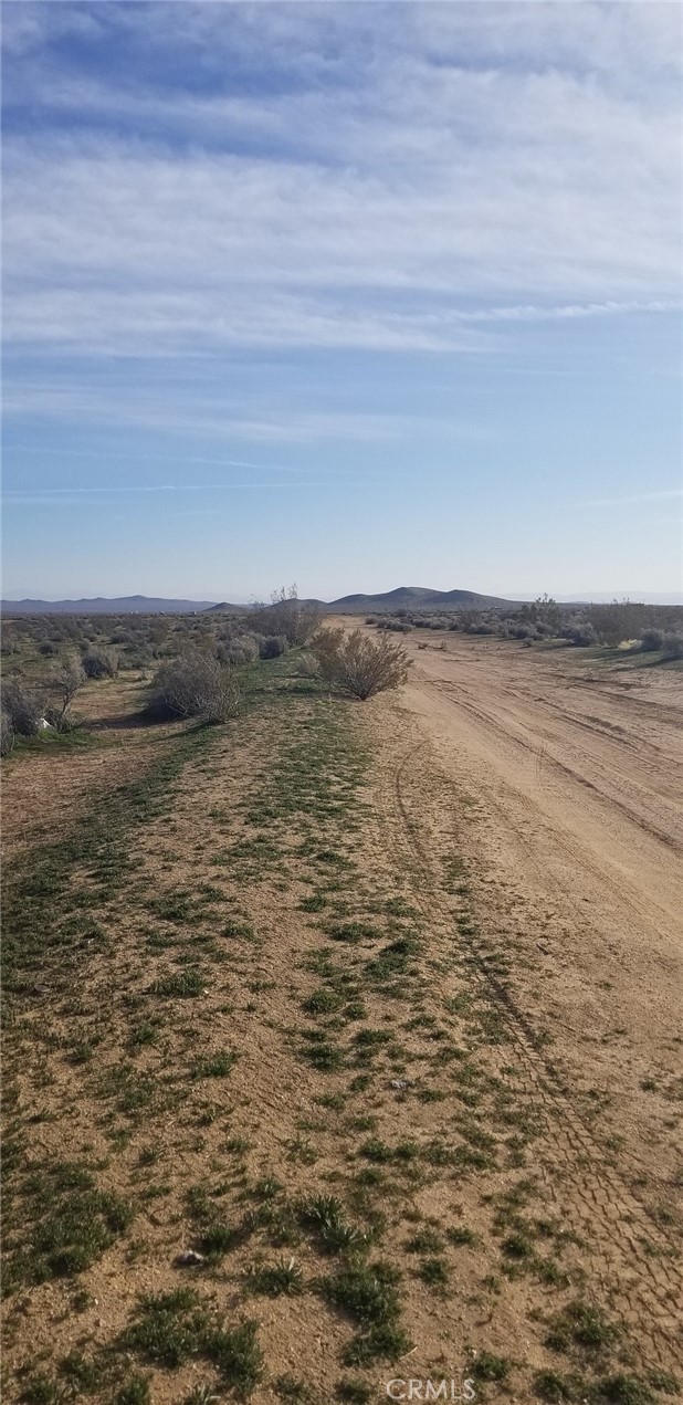 Very nice investment parcel at the end of Highway 58. Flat, level, buildable. East of Mojave Spaceport. There are 4 adjoining - 2.5 acre parcels to be included in this sale spanning from 20th Street West to 23rd Street West. Close to Highway 58 intersection. South of the new Mojave Inland Port.