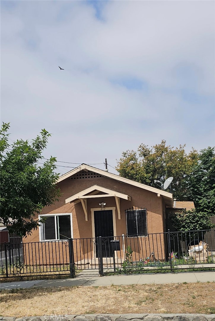 Investor's Dream or Perfect Starter Home with Rental Potential! This charming 2 bed, 1 bath front house includes a 1 bed, 1 bath addition in the rear ideal for multi-generational living or rental income. Whether you're an investor seeking strong returns, a family looking to offset your mortgage by renting out the back unit, or a couple wanting to live in the back while renting the front, this property offers flexibility and opportunity. The spacious lot features two access points, allowing for RV parking or potential for an ADU (Accessory Dwelling Unit). Located near the 60 & 10 Freeways, you're connected to everything. And with the soon up-and-coming additions to Ontario, there’s added potential for future property value growth. Don’t miss out on this high-opportunity home in a rapidly developing area!