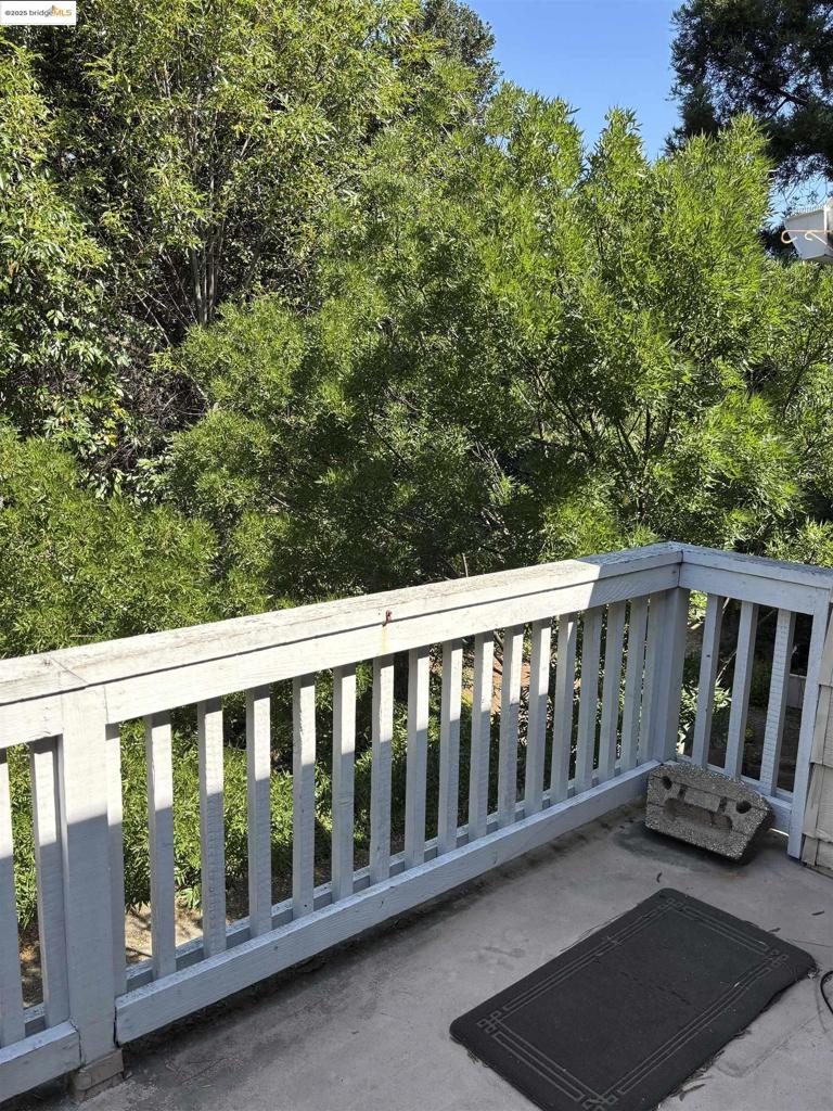 Country Village HOA is professionally managed. Not only does it provide a well designed, and well kept environment, it also offers the amenities you expect including Gunite Pool,Tennis Courts, BBQ Facilities, Walking trails, and Privacy. This upstairs unit offers a WNW facing view. Watch the birds, the clouds and the Sunset from your lrg private balcony off the Living Rm and the Master. The ambience is Private Tree House Oasis. This Oasis is minutes from shopping, entertainment, and access to Major Freeways. Don't forget to 'check out, Down Town Martinez, not just the County Seat, but a Historical Icon with a unique blend of old and new. Find a New Restaurant or visit the River Front, and don't forget the Local Parks. Martinez is a True Historical California Town.