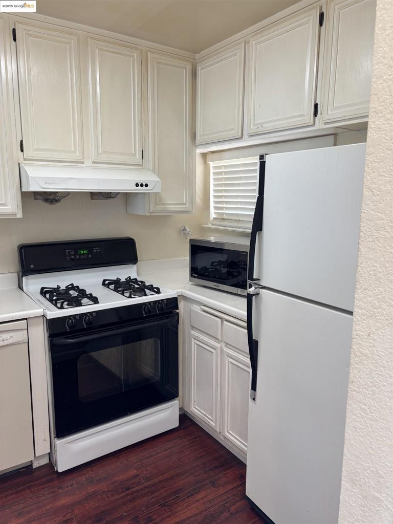 Prices have fallen, and the Owner is motivated. This is a truly lovely upscale Condo Complex; with a forest of Trees, and quiet ambience, a private balcony off the Living Rm and the Master. It feels like you are in your own forest retreat. Owner recently painted the unit. He installed a New Water Heater, New Furnace, New toilets, and replaced all under sink flooring. 'Newer' Washer and Dryer included. New faucets in kitchen, and the appliances are working and in good condition. This Oasis is minutes away from shopping, and entertainment, as well as Work. You would never know you have two major Freeways within a couple minutes drive.