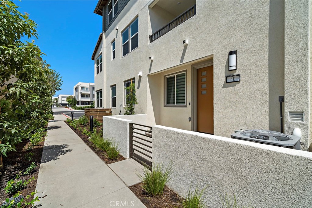 Enjoy this BRAND NEW, never lived in, 3 bed and 2.5 bath luxury condo in the heart of Anaheim Platinum Triangle!! Enter to find a bonus sitting area with direct 2-car garage access. Head upstairs to enjoy the tasteful modern kitchen equipped with stainless steel appliances, stylish white quartz countertops, a walk-in pantry, large island with breakfast bar seating, and under cabinet task lighting. The second level also offers a powder room perfect for guests, open living space, and a balcony to enjoy the sunshine. Find ultimate convenience on the third level, featuring the laundry area, two secondary bedrooms with full bathroom and soaking tub, and the primary suite with a walk-in closet, large shower, and dual vanities. Enjoy the best of Anaheim living in this prime location right off the 5 freeway, within a 1 mile walk to Angels Stadium, the Honda Center, Anaheim Train Station, and 2 miles to Disneyland!