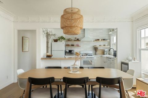 Photo of 1640 S Gramercy Pl, Los Angeles, CA 90019 (MLS # 26784331)