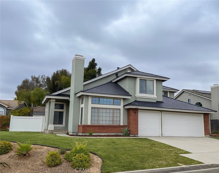 Nestled on a quiet private cul-de-sac in beautiful Yorba Linda, this impressive 4 bedroom, 3 full bath home offers 3,145 sq. ft. of spacious living on a generous 10,800 sq. ft. lot. This is a rare opportunity to lease in one of the most desirable Orange County communities, known for its award-winning schools, upscale shopping, scenic parks, and top-rated restaurants.  Step inside to an expansive, light-filled floor plan with multiple living and entertaining spaces, ideal for gatherings, remote work, or everyday comfort. The well-appointed kitchen flows seamlessly to the family and dining areas, while the oversized backyard offers plenty of room for outdoor enjoyment and relaxation.  This residence includes three large bedrooms and three full bathrooms, totaling 3,145 sq. ft. of interior living space on a 10,800 sq. ft. lot situated at the end of a peaceful cul-de-sac.Oh, and did we mention there are solar panels that afford the tenant an extremely low electrical bill? There's also an EV Charger in the garage and water softener and reverse osmosis water treatment.  Additionally, there's a refrigerator, washer, and dryer are initially included for tenant convenience, and a minimum one-year lease is required.  Homes of this size and location rarely come available as rentals. Don’t miss this chance to enjoy comfort, space, and the best of Yorba Linda living. Available now—schedule your private showing today!