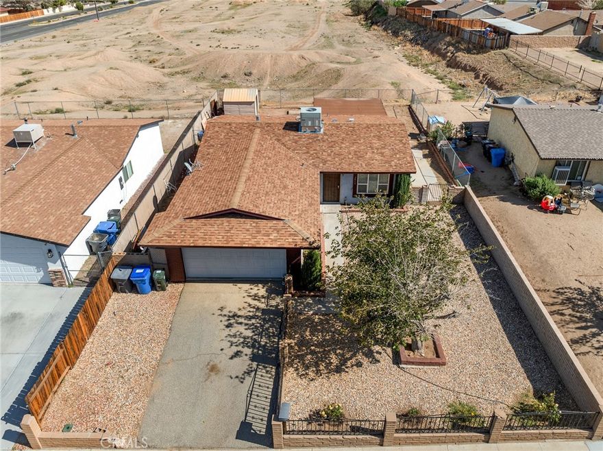 Welcome to 2013 Rushmore Drive, a charming 3-bedroom, 1.5-bath single-story home located in a quiet, established neighborhood of Barstow. Built in 1972, this home offers 962 sq. ft. of comfortable living space on a 6,480 sq. ft. lot, featuring a functional floor plan, an attached garage, and a spacious fenced yard. Enjoy convenient access to shopping, dining, and commuter routes, with parks and schools nearby. The property is tenant-occupied and being offered for sale with tenants in place, providing an excellent opportunity for those looking to add a well-maintained home to their portfolio. Sale is subject to existing tenancy; please do not disturb occupants.