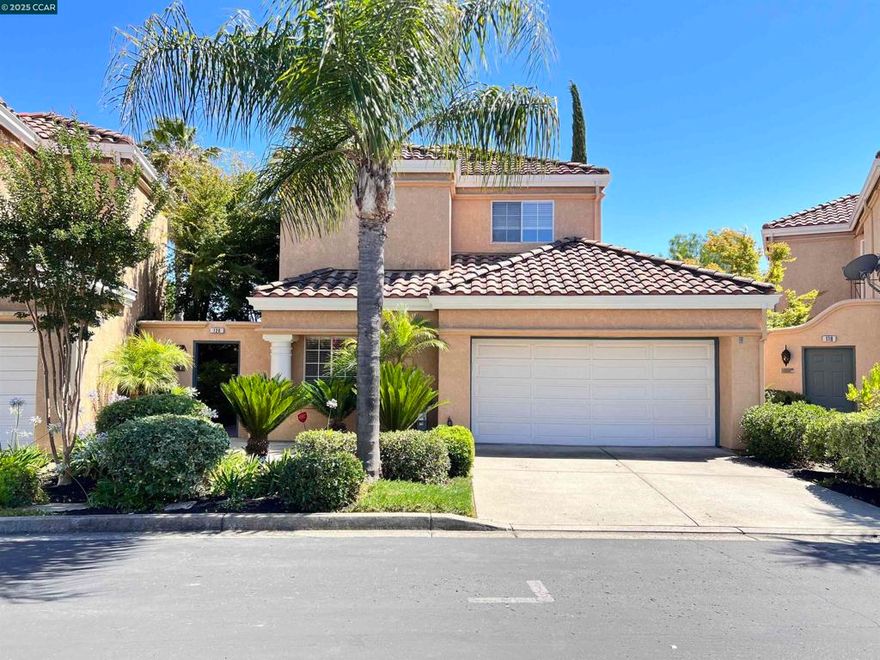 This gorgeous 3-bedroom, 2-bath home located in the highly sought-after Echo Ridge gated community has wonderful views awaiting you! From the moment you step through the lovely courtyard, you’ll be amazed by the open floor plan, high ceilings, and a lovely living room with a fireplace and highlighted with walls of windows. The elegant dining room adds the touch for entertaining, a place to relax with friends and family.  This home offers a downstairs bedroom and full bath, a laundry room, and spacious living areas. The updated kitchen is a chef’s delight with stainless steel appliances, a gas stove, granite countertops, and a breakfast nook that opens to the large backyard and views of the hills.    Upstairs, the large primary suite is a true retreat featuring high ceilings, a second fireplace, and a beautifully remodeled bathroom with a freestanding tub, separate shower, dual vanity, and a large walk-in closet with organizer.    Beautiful flooring, modern light fixtures, recessed lighting, and a new central HVAC system. Outside, the backyard is a private oasis perfect for entertaining, relaxing, and enjoying the breathtaking views. This gated community offers a pool, tennis court, trails and privacy. Minutes from shopping, dining, ClubSports, City Center, WholeFoods, Trader Joes