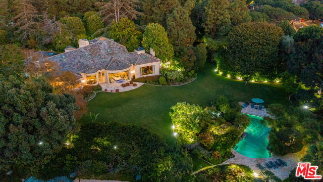 The rarest of the rareThe Simon Estate, one of the largest estate properties on the LACC golf course located within the City of Beverly Hills 90210, situated on 2.5 acres of stunning park-like grounds. Located behind massive iron gates up a long driveway to a large motor court. Featuring rolling lawns, pool, tennis court & world class gardens set amidst spectacular landscaping. Famed architect Peter Choate designed the sprawling home in 1985. Enter into an atrium w/soaring beamed ceilings, open floor plan and natural light, perfect for the California lifestyle, large living areas, paneled library & formal dining, perfect for large scale entertaining. Center island kitchen w/an informal dining area, commercial appliances, a separate catering kitchen & pantry. Step into the large master suite w/dual master baths that lead to dual spacious walk-in closets. The interior also features a large master study, 3 beds on main floor w/en suite bath, maids & powder. Pre-qualified clients only.