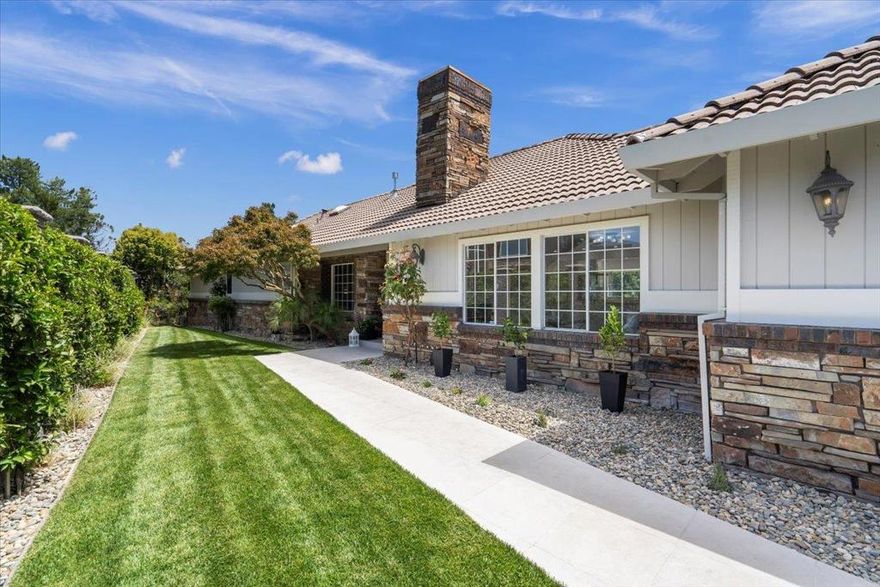 Welcome to this private, gated city-light-view estate. New remodel finished! Wow factor! Spacious 4,000 sq. ft. located in the vibrant West Side. Custom built home on a premier gated subdivision "Live Above The Valley Floor." Located close-in within blocks of all West side amenities. Private, gated, audio-video equipped access. No HOA fees. Featuring five bedrooms, including a primary suite with a retreat, walk-in closet, private view decking, and ground floor convenience. The kitchen is a chef's dream, equipped with new shaker designed cabinets, a gas cooktop, quartz countertops, built-in oven, and modern GE Profile appliances like a new frig-freezer, 1/2 HP disposal. Enjoy meals in the formal dining roomand breakfast nook. The home features high ceilings, radiant flooring, and a combination of Italian tile and wood flooring. Relax by the fireplace in the separate family room, or enjoy the seamless kitchen/family room combo. Laundry is a breeze with facilities on the main floor utility room. Located within the Gilroy Unified Elementary School District, this property is ideal for families. Additional amenities include a security gate, skylights, vaulted ceilings, and a three-car garage. Don't miss this opportunity to own a home with both comfort and style in Gilroy.