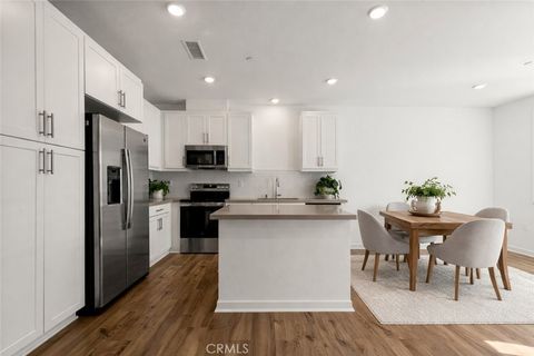 Photo of 6123 Valentina Way #303, Eastvale, CA 92880 (MLS # SW26021695)