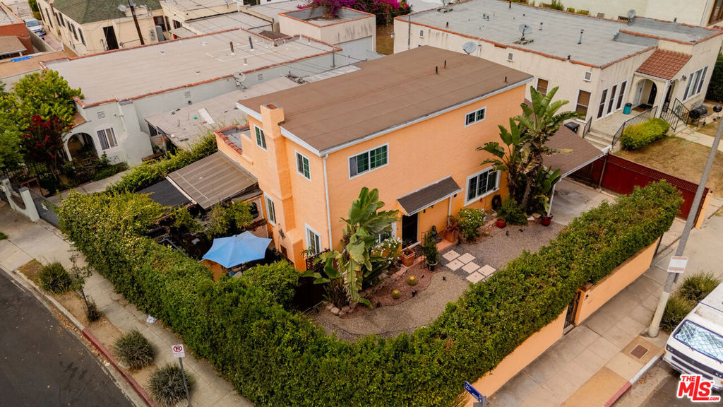 Coming soon! Mid City gem waiting for you to call it home. This inspiring property sits on the corner of 21st Street and Claudina Avenue, walking distance to cafes, galleries and shops on both Washington Blvd and Adams Blvd. This home includes three bedrooms and a bonus room that' s perfect for an office or art studio. Downstairs you'll find a cozy living and dining area that opens up to an al fresca style patio, perfect for our warm LA nights. The property is beautifully enclosed by a lush ficus privacy fence providing just enough privacy to actually utilize your front yard while being able to stay connected with your neighbors. This is an ideal corner lot property with endless opportunities... definitely won't stay on the market long. Contact Listing agent for showings.