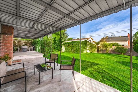 Tiny photo for 6922 Woodlake Avenue, West Hills, CA 91307 (MLS # SR26018834)