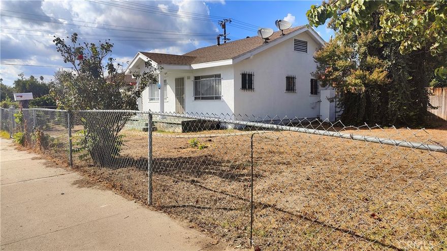 Single Family House with big lot. House is built toward the front left of the lot if you are looking at the house, the right side of the lot and the back yard is big enough to expand the house or build an ADU(s) or possibly another house (buyer to verify with City).  2 decent size bedrooms with walk in closet and another small storage room which can be use as 3rd room with laminate flooring. 1 full bathroom in decent shape. Large living room and a dinning area.  House has front porch, front gates and back gate securing the house. Parking in the house back yard with secure gate from alley access. Very large backyard with patio and a big mature fruiting Avocado tree. Kitchen and bathroom are in decent condition. Central AC/Heat.  Laminate wood flooring easier for cleaning. Convenient location just 3.3 miles away from Chino Hills costco, 1.9 miles to Pomona Walmart, and close to Home Depot, restaurants, supermarkets.