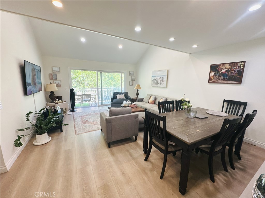 Amazing Canoga Lakes 2-bedroom upstairs unit with soaring high ceilings and tranquil atmosphere overlooking the streams and lush landscaping. This is a highly upgraded unit with beautiful wood floors, totally redone bath and remodeled kitchen with premium appliances. The spacious balcony overlooks the incredible scenery. It includes two parking spots that are side by side (spots 61 and 62). HOA amenities include 2 sparking pools, 2 Jacuzzis, work out room, lighted tennis courts and 18 acres of walking paths, towering trees, green belts and sitting benches to enjoy the fascinating views. Canoga Lakes is situated in a vibrant neighborhood close to transportation, hospitals, fine restaurants and entertainment. You are in close proximity to "the Village", Topanga Plaza Shopping Center, Fallbrook Mall, Malibu Wines and so much more. Relax and enjoy yourself, you are going to love living in Canoga Lakes.