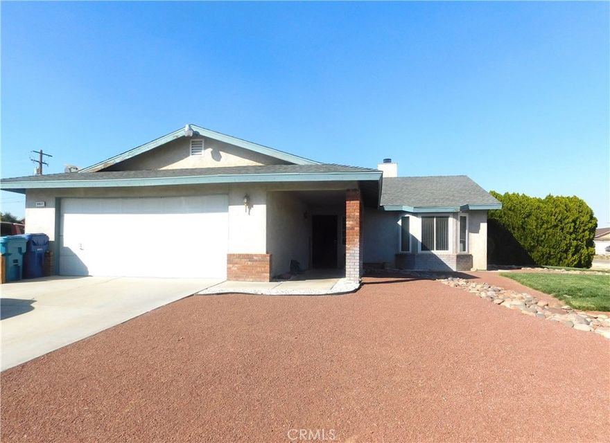 DOUBLE CORNER LOTS WITH PLENTY OF ROOM FOR STORAGE. 3 bedrooms + 2 full bathrooms on natural gas. Home offers office (bonus room) and indoor laundry.  Large great room with wood burning fireplace and custom flooring throughout. Lovely paint color throughout home. Beautiful kitchen with quartz countertops, stainless steel appliances, and oversized breakfast bar.  Large covered/enclosed patio with gas burning fireplace and radiant heating is wonderful for year-round outdoor living. Front and backyard nicely landscaped with large above ground pool with deck in the back. Backyard features are an enclosed garden with sprinkler system. Oversized 2 car garage has an industrial sink and workbench.