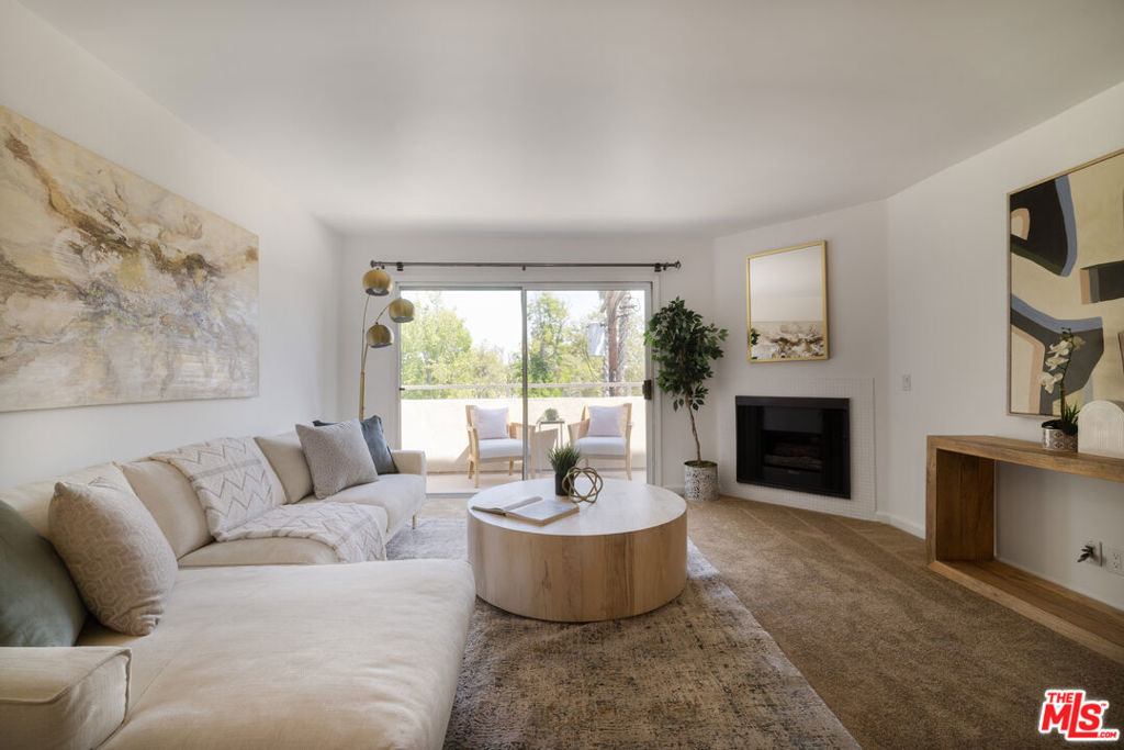 Welcome to this exceptional unit in the heart of Sherman Oaks! Situated on the top floor of the prestigious Palmia Complex. This light-filled, open concept 2-bedroom 2-bathroom unit features a spacious layout and a well appointed kitchen- equipped with a gas stove, brand new refrigerator, microwave, dishwasher and an oversized breakfast bar which is perfect for casual dining or entertaining. The sun-drenched living area boasts a cozy fireplace, a large balcony, and an adjacent dining area creating a warm and inviting atmosphere. Primary bedroom includes a private balcony with tree top views, en-suite bathroom, and generous walk-in closet. Spacious versatile secondary bedroom is perfect for children, guest or as an in-home office. Resort style amenities include a sparkling swimming pool, jacuzzi, outdoor grilling area, recreation room with kitchen, gym and a private dog run. Centrally located near dining, shopping, and freeway access. This home offers both comfort and convenience in one of LA's most desirable neighborhoods. Unit also includes in-closet washer/dryer, 2 tandem spaces and EARTHQUAKE INSURANCE!