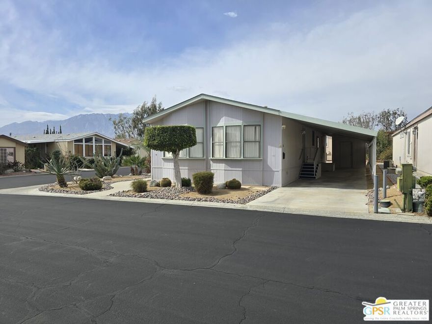This 1988 3bed,2bath almost 1400 sq ft home is situated on a prime corner lot with great mountain views from front porch (no 433A on file but seller will cooperate for 433A if buyer is seeking financing and lender most likely will require).  One owner only for this property. Would come use the property 6-12+ times a year, so it's in very good condition. Even though it has not been updated much, seller will consider giving up to a $10,000 credit for upgrades by new buyer provided offer near or at asking price. Don't miss out on this opportunity to be part of the premier 55+ fee simple (you own the land/low HOA of $300/mo) manuf home community of Vista Montana. Guard Gated (Mon thru Sat 9a-3p). There's a resort feel to the community, beautiful clubhouse with large TV lounge, exercise room, meeting room and large kitchen for private parties, gorgeous main pool/spa, on-site management, greenbelt, satellite pool/spa, social activities, card play and billiards rooms...even a doggie park. Nice easy flow floor plan from entry to LR to Kitchen to the 2 guest bedrooms on one side of the house and primary bedroom on other. Master bathroom includes soaking tub, walk-in shower. Guest bathroom has tub-shower combo. Home comes with all appliances, washer dryer units and furnishings are included other than LR TV. 2 car tandem carport with nice wooden shed. Come see,Make offer.
