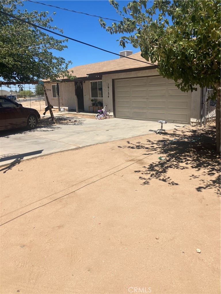Beautifully remodeled 2-bedroom, 2-bathroom home in Hesperia! This single-story residence offers 972 sq. ft. of living space on a spacious 1.06-acre corner lot. Features include a modern interior, bonus room/office, indoor laundry with sink, and an attached 2-car garage. The property also offers RV access and plenty of room for outdoor activities or future possibilities. Conveniently located near Bear Valley Rd and 7th Ave, perfect for commuters. Move-in ready with desert views and endless potential!