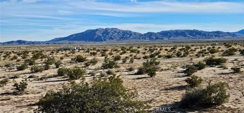 Photo of 801 Valle Vista Rd., 29 Palms, CA 92277 (MLS # HD26056874)