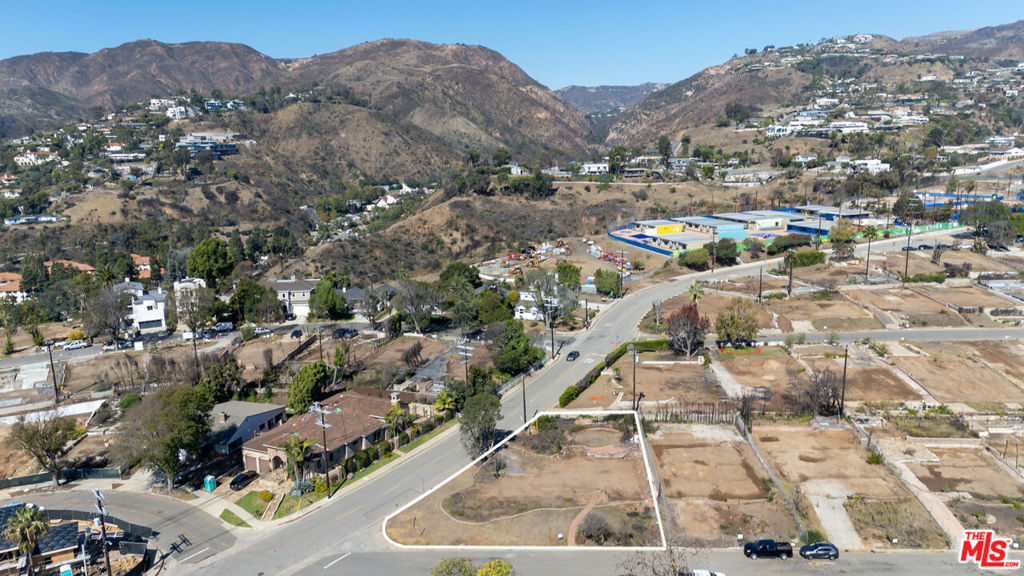 Prime 9,239 SF flat corner lot located in lower Marquez Knolls. Situated just blocks from the newly reopened Marquez Elementary School and minutes from Palisades Village and the beach, this property offers outstanding potential in a sought-after neighborhood. Possibility for ocean views from a future second story and/or rooftop deck. The previous structure was approximately 1,873 SF, and both Phase 1 and Phase 2 debris clearance have been completed. Neither Seller nor Broker/Agents guarantee the accuracy of the square footage, lot size, permits or other information concerning the conditions or features of the property. Buyer is advised to independently verify the accuracy of all information (including square footage) through personal inspections and with the appropriate professionals.