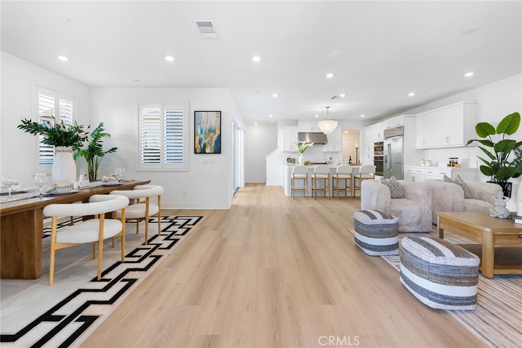 Welcome to this brand-new 2023-built home located in the desirable Solis Park community at Irvine Great Park. This popular floor plan features an open layout, a south-facing orientation with abundant natural light, and modern finishes throughout. The first floor includes a full bedroom and bathroom, and a gourmet kitchen with white cabinetry, thick quartz countertops, stainless steel appliances, and a built-in refrigerator.
The home has been upgraded with stylish lighting, flooring, and shutters. Perfectly situated near The Retreat at Solis Park, residents can enjoy a resort-style pool, spa, BBQ areas, and fire pits. Just a 3-minute walk to Solis Park K–8 School and Portola High School, and close to Irvine Spectrum, UCI, South Coast Plaza, and newport Beach.