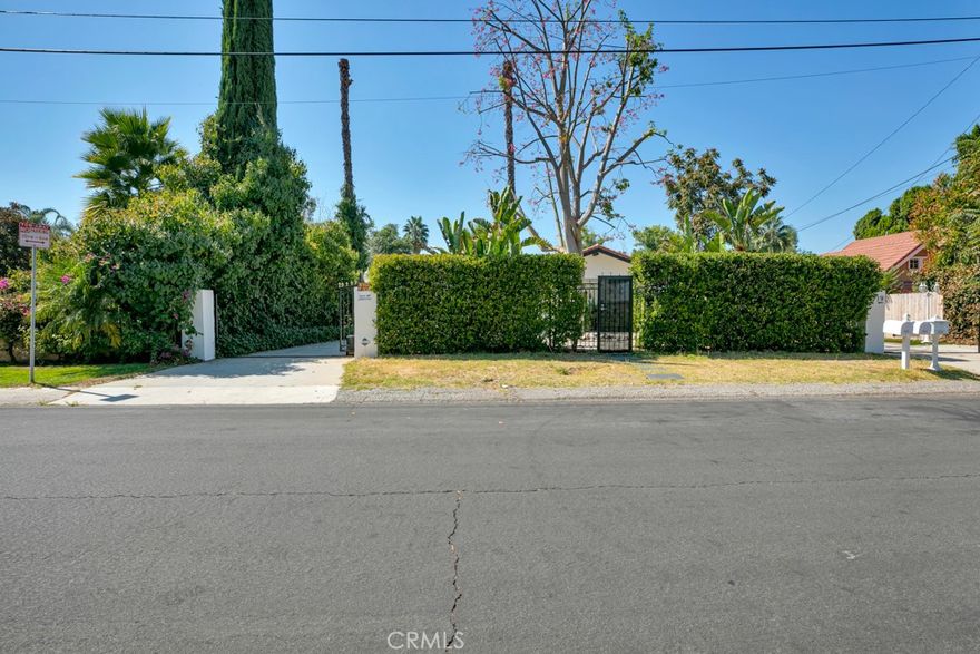 An incredible opportunity to lease a true estate-like, turn-key home in the heart of Tarzana.
This spacious residence offers nearly 4,000 sq ft of living space on a sprawling half-acre gated lot, providing exceptional comfort, privacy, and flexibility.

With 5 bedrooms and 5 bathrooms, the home is perfect for a large family or anyone seeking abundant space. The standout primary suite features a generous walk-in closet, while the separate in-law quarters—complete with its own private entrance, living room, kitchenette, and bathroom—offers ideal accommodations for extended family, guests, or a private home office setup.

Recently remodeled, the home includes travertine tile floors, new windows, updated bathrooms, brand-new carpet, fresh paint, smooth stucco, new gates, new landscaping, and more, creating a clean, modern, move-in-ready environment.

The fully gated lot features a spacious circular driveway with ample parking, including room for an RV and multiple vehicles. The expansive backyard offers endless possibilities, with enough space for outdoor entertaining, recreation, or future amenities.

This is a rare chance to lease a beautifully updated estate-style home in one of Tarzana’s most desirable neighborhoods.