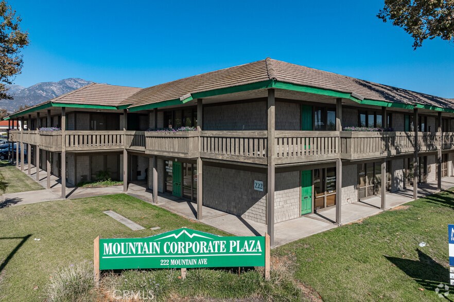 This distinguished two-story professional garden office building boasts a beautifully landscaped open-air central courtyard and expansive corridors, fostering a tranquil and inviting atmosphere. Surrounded by lush greenery and offering ample parking, the property seamlessly combines convenience with aesthetic charm. Ideally positioned at the high-traffic intersection of Mountain Ave. & 9th St., it enjoys exceptional visibility and accessibility. Professionally managed and impeccably maintained, the building offers effortless connectivity to both the I-10 and 210 freeways, ensuring a seamless commuting experience. Suite 203 - This distinctive second-floor corner suite encompasses approximately 1,378 rentable square feet. The layout includes a reception area, conference room, open bullpen, and four private offices. The suite will be available for occupancy beginning July 1, 2025.