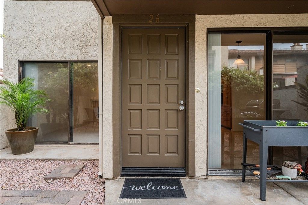 Photo of 5800 Owensmouth Avenue #26, Woodland Hills, CA 91367 (MLS # SR25195683)